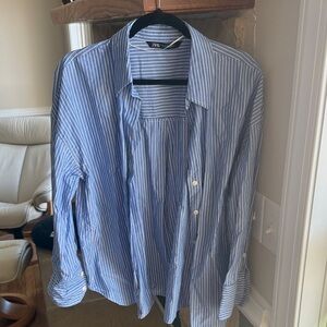 Men’s blue / white striped Zara button down shirt.